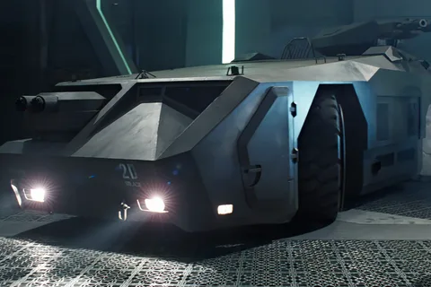 The M577 APC parked in the Sulaco hangar in Aliens, marked 2D, with headlights on and the roof turret stowed