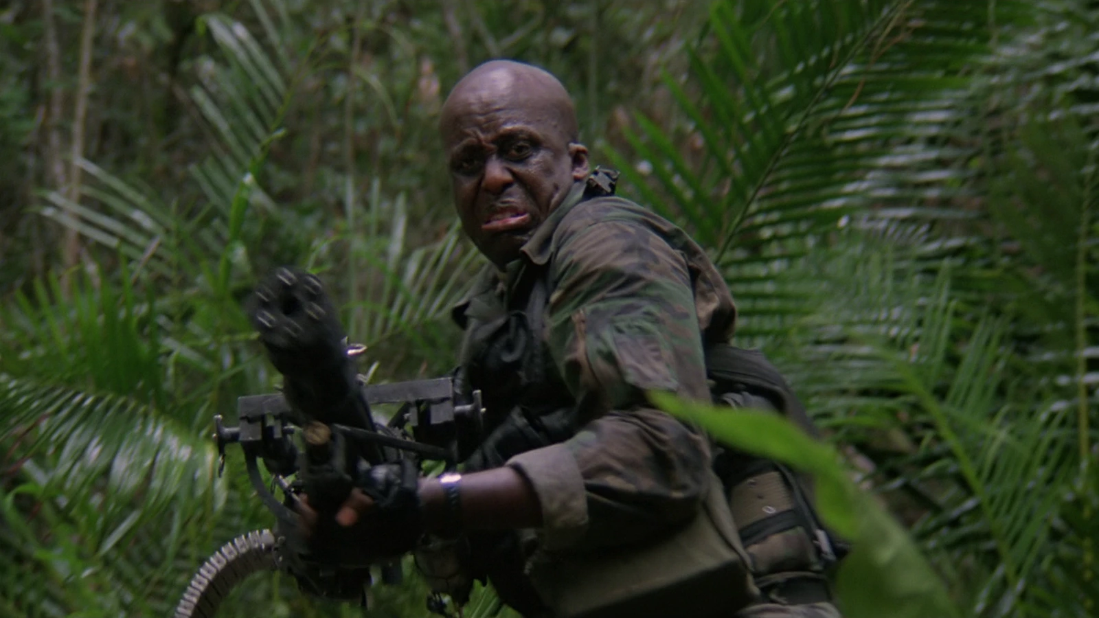 Mac Eliot, played by Bill Duke, holding Old Painless in Predator