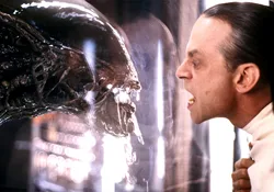 Dr. Gediman with a cloned Xenomorph