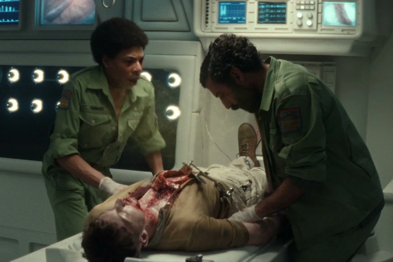 Malachite on the Maginot medbay table during the tick surgery in Alien: Earth