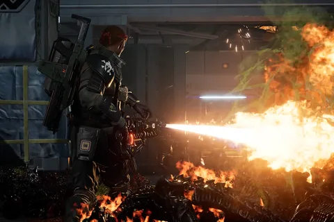 Marauder class Marine firing the OCAP-91 Volcan flamethrower with an M12A1 Rocket Launcher on his back in Aliens Fireteam Elite 2