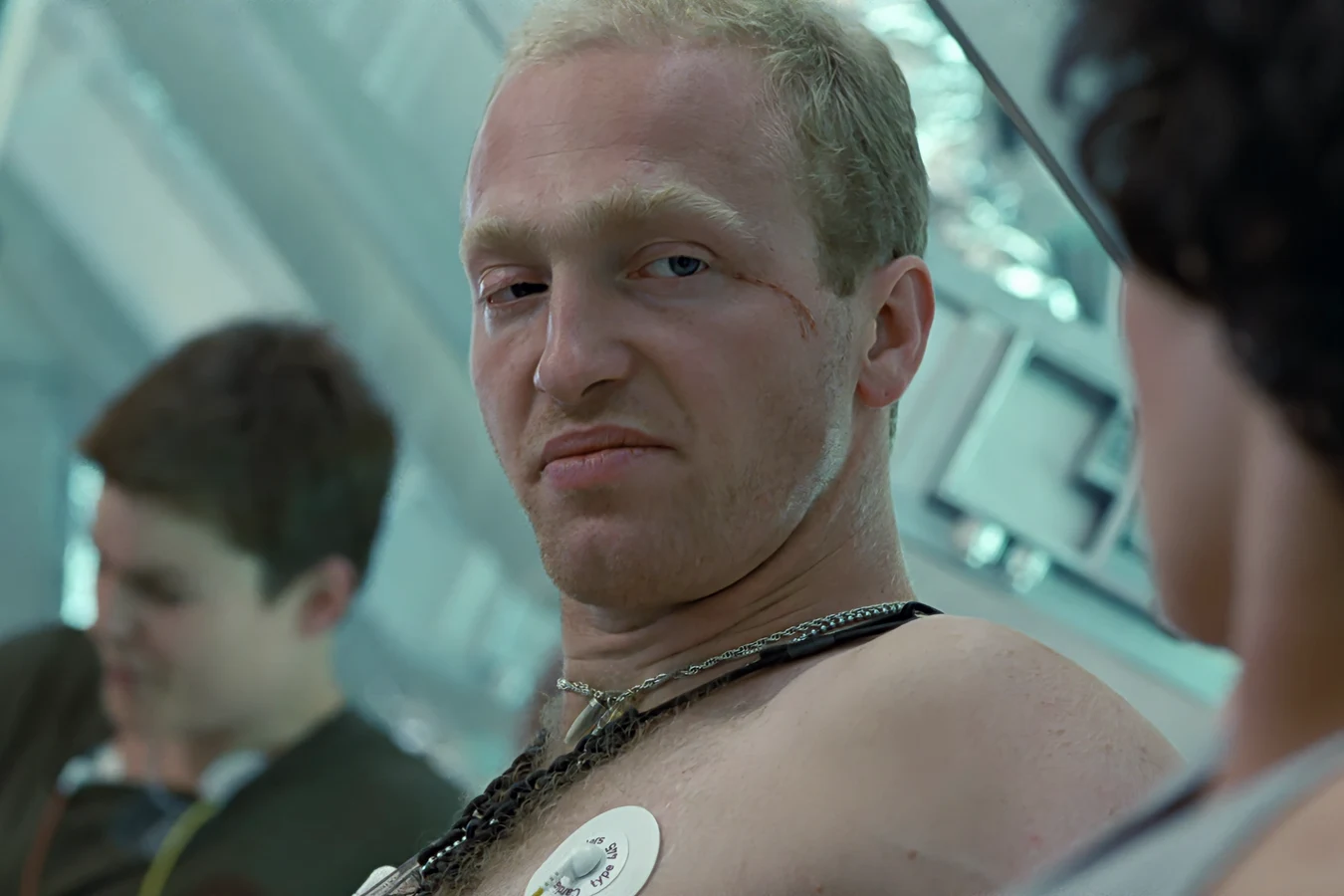 Mark Drake waking from hypersleep aboard the Sulaco in Aliens, with the scar at his left eye