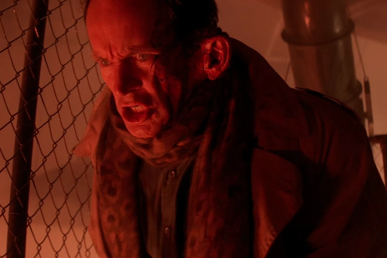 Michael Bishop shouting behind a fence on Fury 161 after Aaron struck him