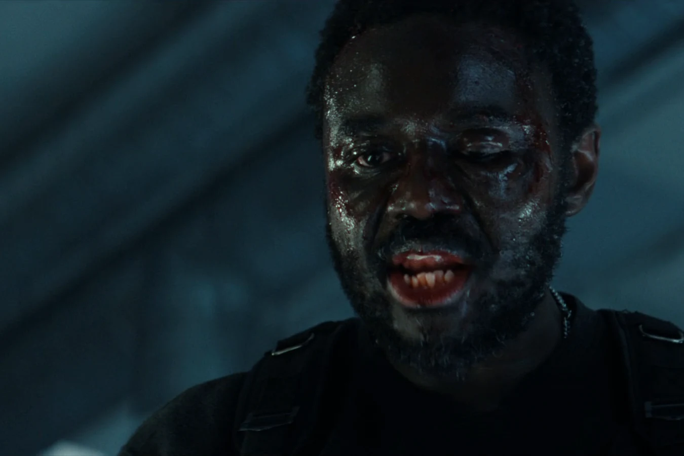 Morrow bloodied and lit from below during his fight with Kirsh in the Neverland lab in Alien: Earth