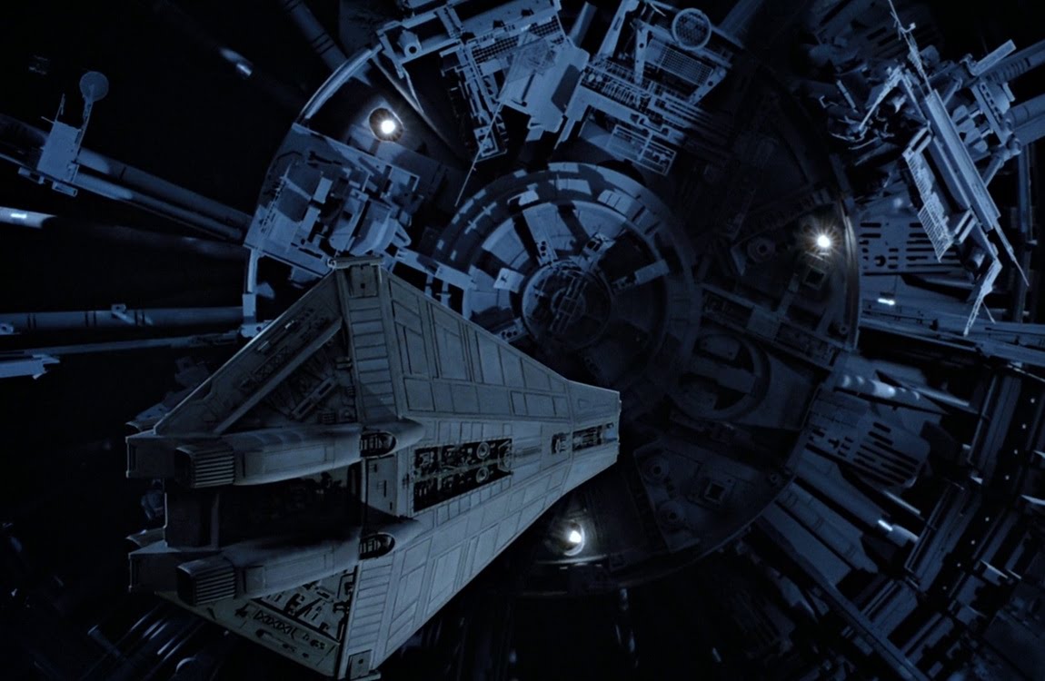 The Narcissus shuttle about to be recovered by a deep space salvage ship