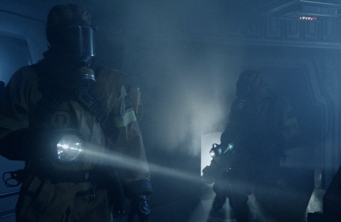 The salvage ship crew inspect the shuttle