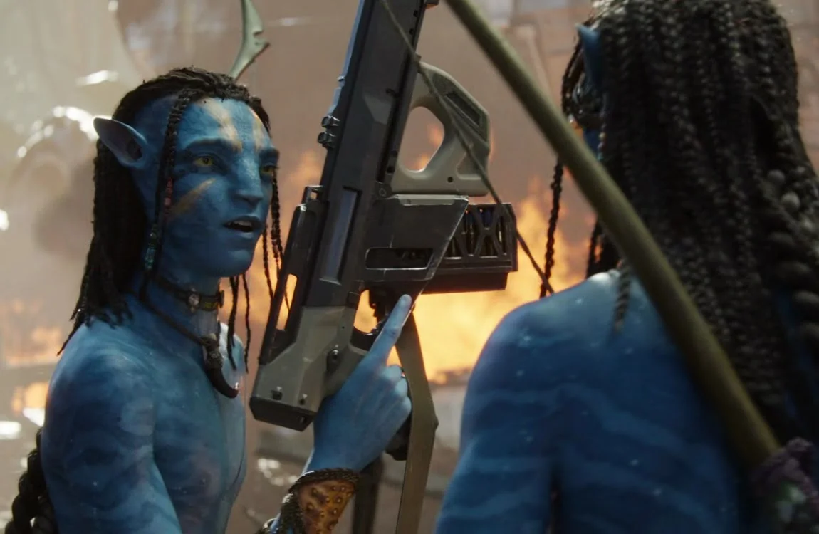 Lo'ak using an RDA weapon in Avatar: The Way Of Water