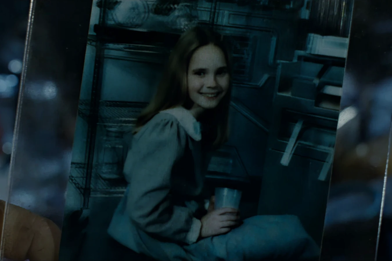 Colony photograph of Rebecca Newt Jorden holding a cup at Hadley's Hope