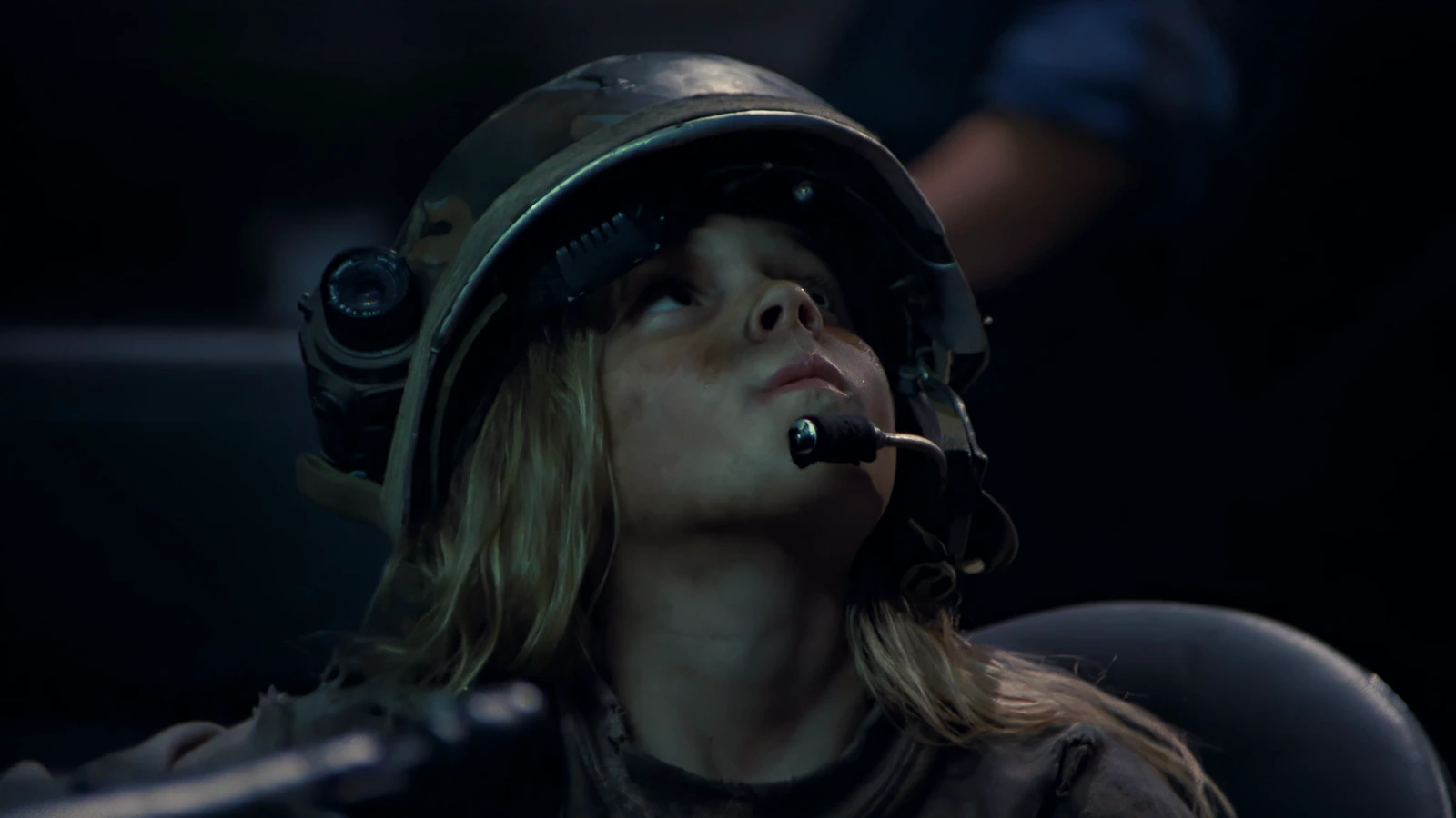 Rebecca Newt Jorden in a Colonial Marine helmet in the Hadley's Hope Colony in Aliens