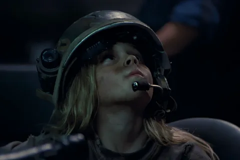 Rebecca Newt Jorden in a Colonial Marine helmet aboard the APC in Aliens