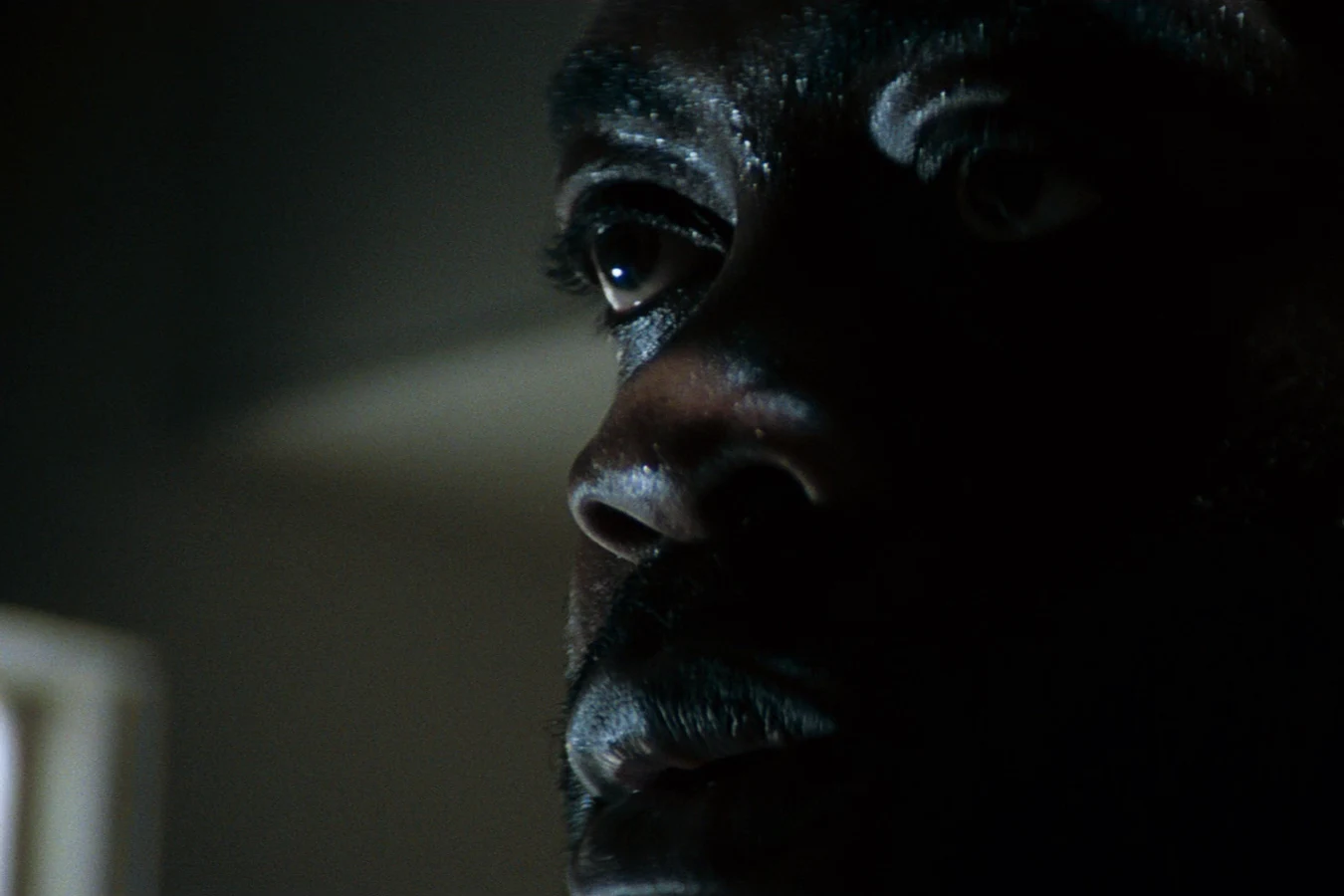 Close-up of Parker's face after the alien takes Brett on the Nostromo