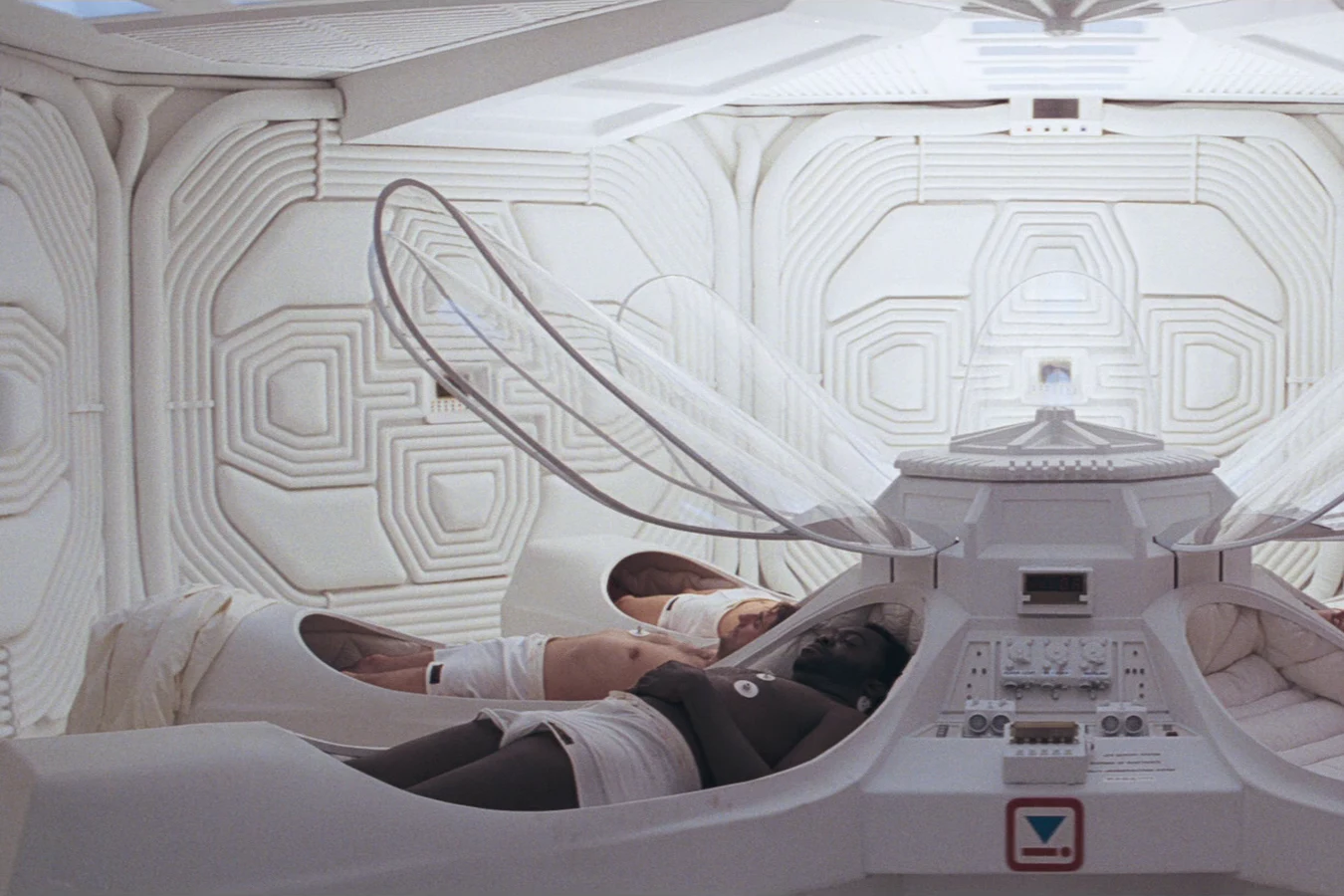 Parker asleep in a hypersleep pod on the Nostromo in Alien