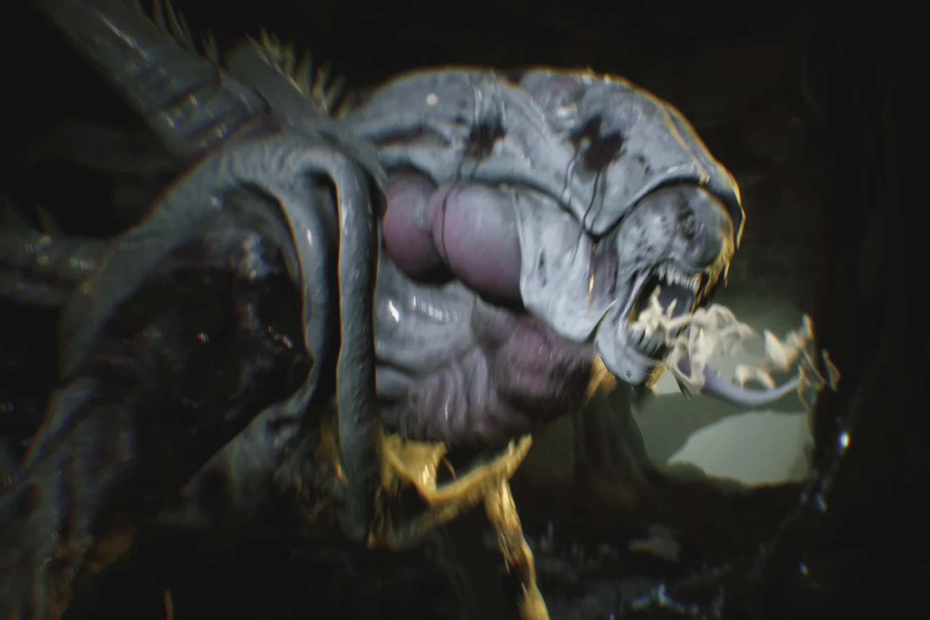The Pathogen Queen opening her mouth as white fluid leaves the jaws