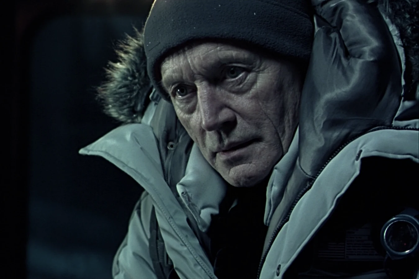 Charles Bishop Weyland in a fur-lined parka and black cap during the Bouvetoya expedition in Alien vs. Predator