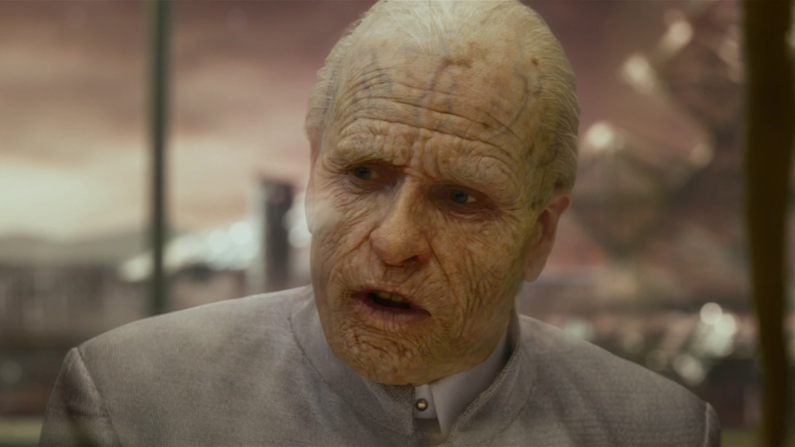 Elderly Peter Weyland speaks in the holographic briefing aboard the Prometheus