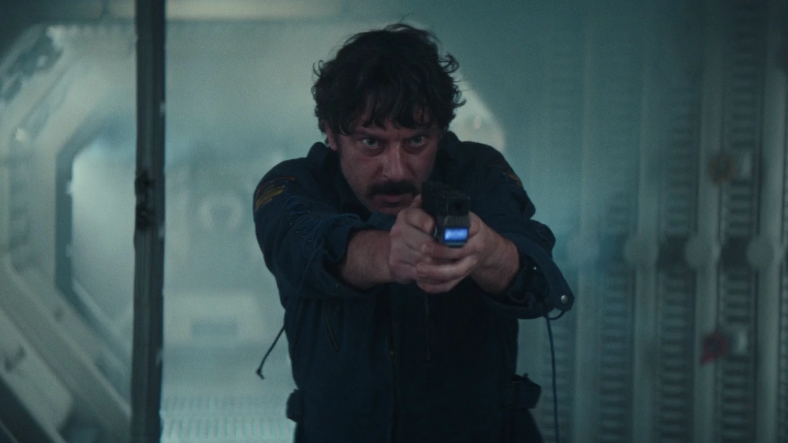 Petrovich in his Maginot chief engineer uniform with PETROVITCH name tape in Alien: Earth