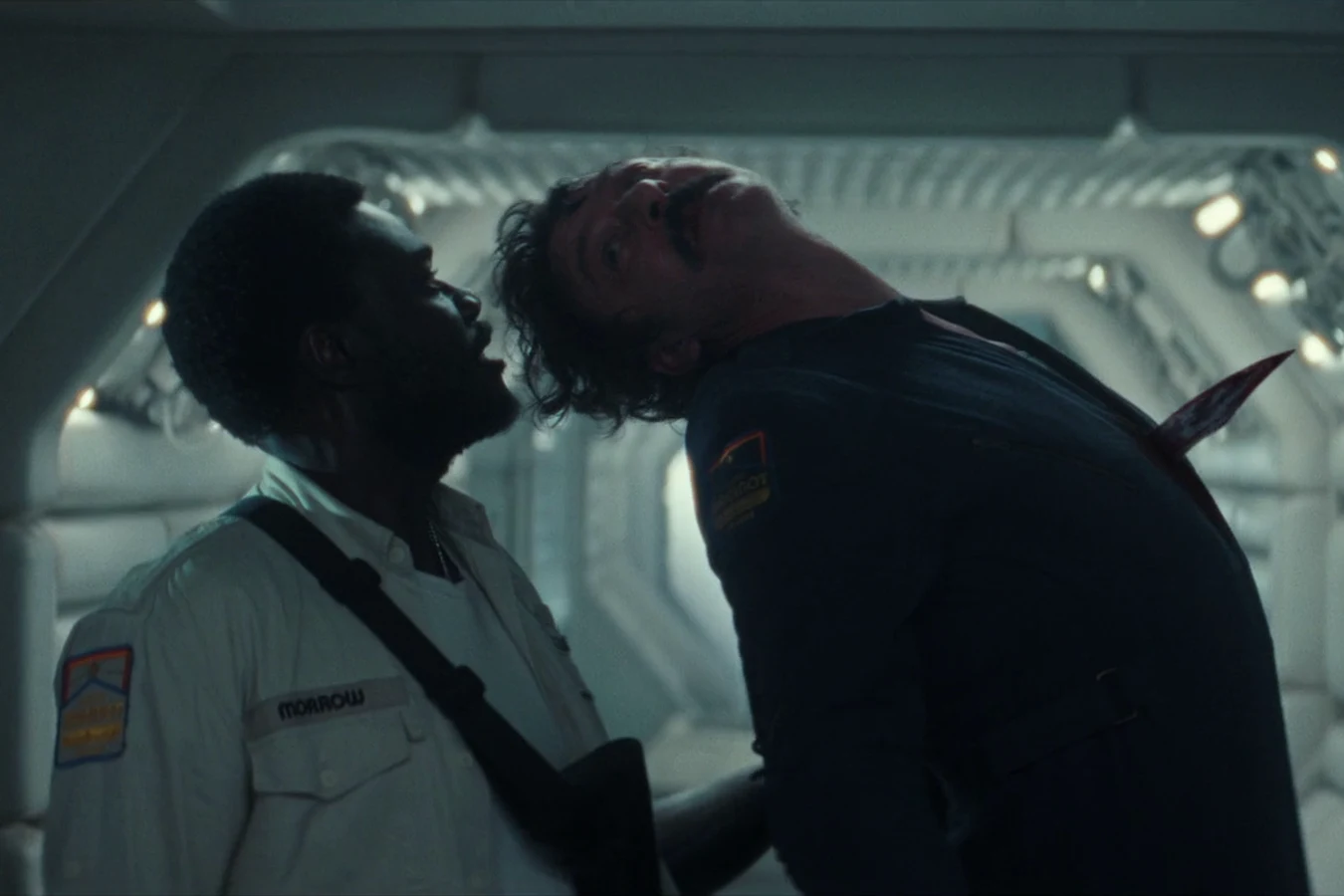 Morrow impaling Petrovich through the chest with his cybernetic arm in a Maginot corridor in Alien: Earth