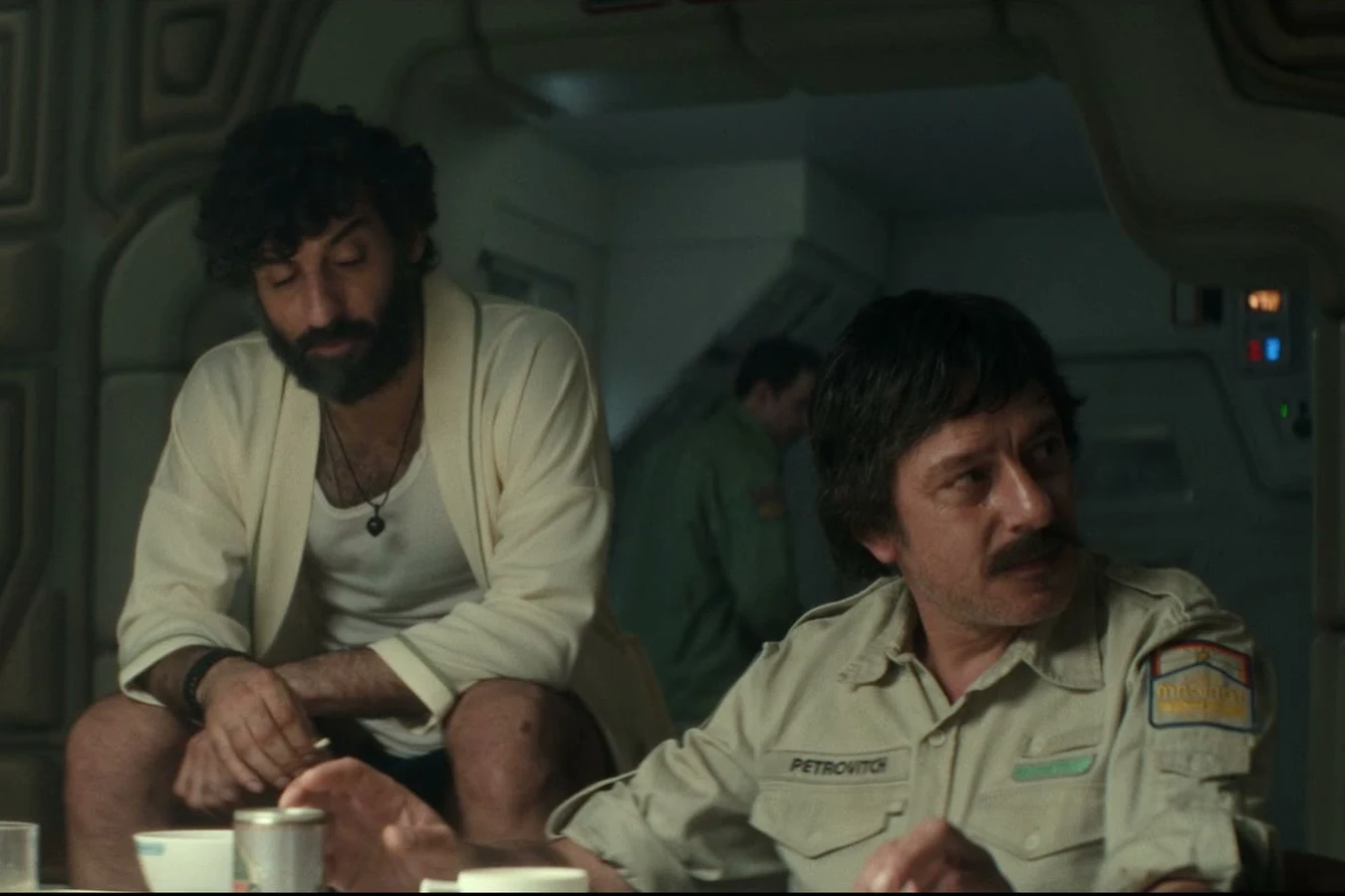Petrovich seated at the Maginot mess hall table in Alien: Earth