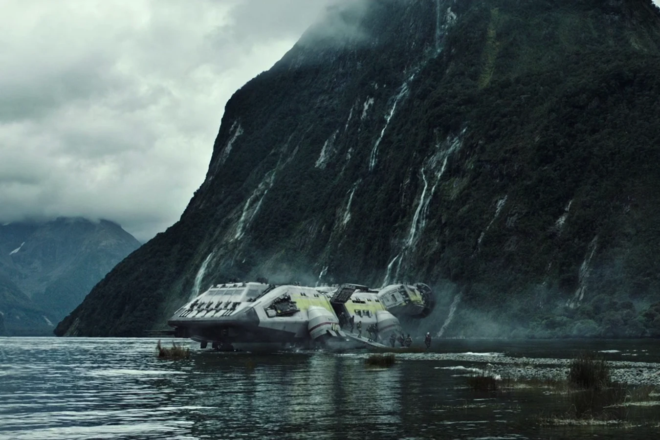Lander One in the shallows under the cliff on Planet 4