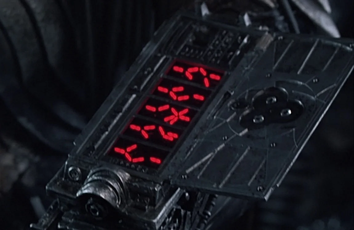 A Predator wrist gauntlet used for controls, displays, and self-destruct