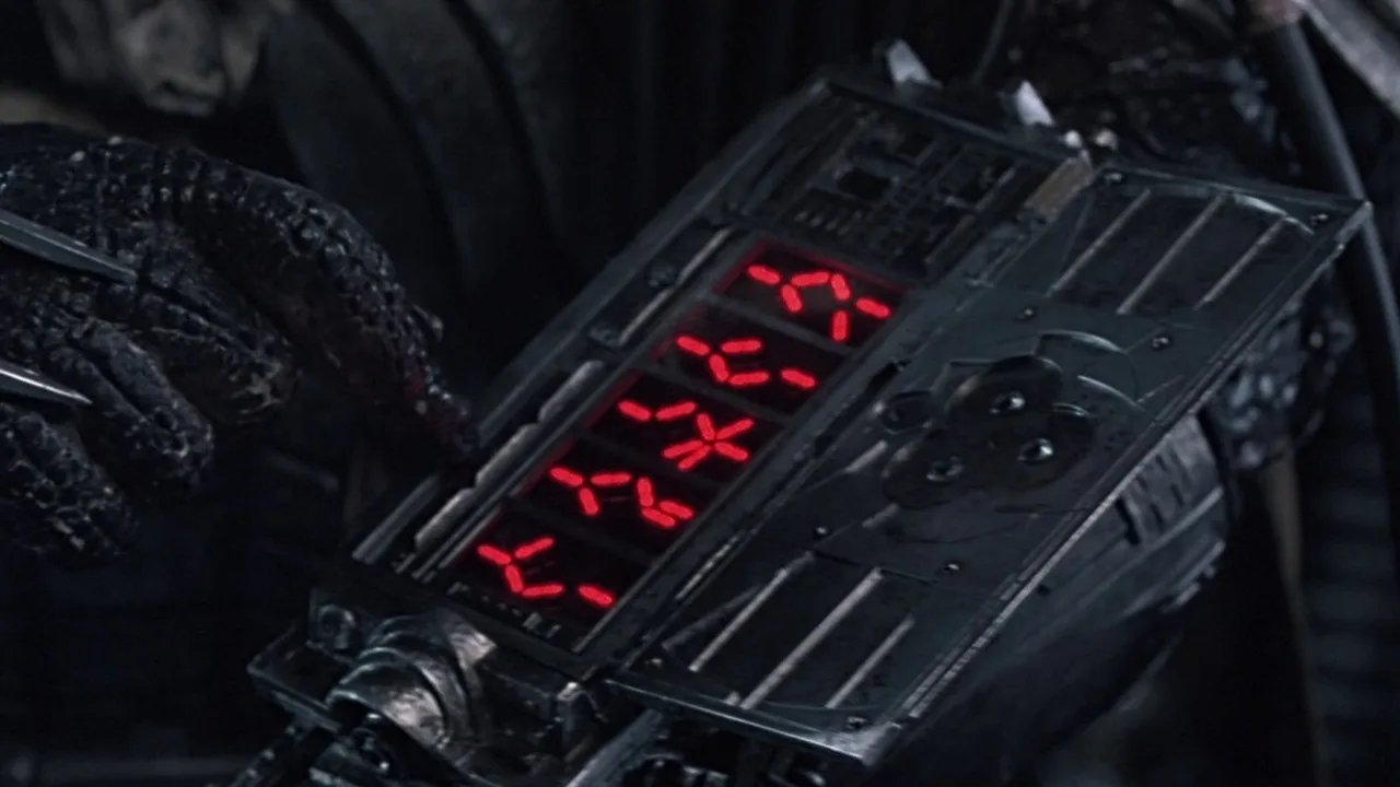 Predator using wrist gauntlet to generate names