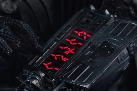 Predator using wrist gauntlet to generate names