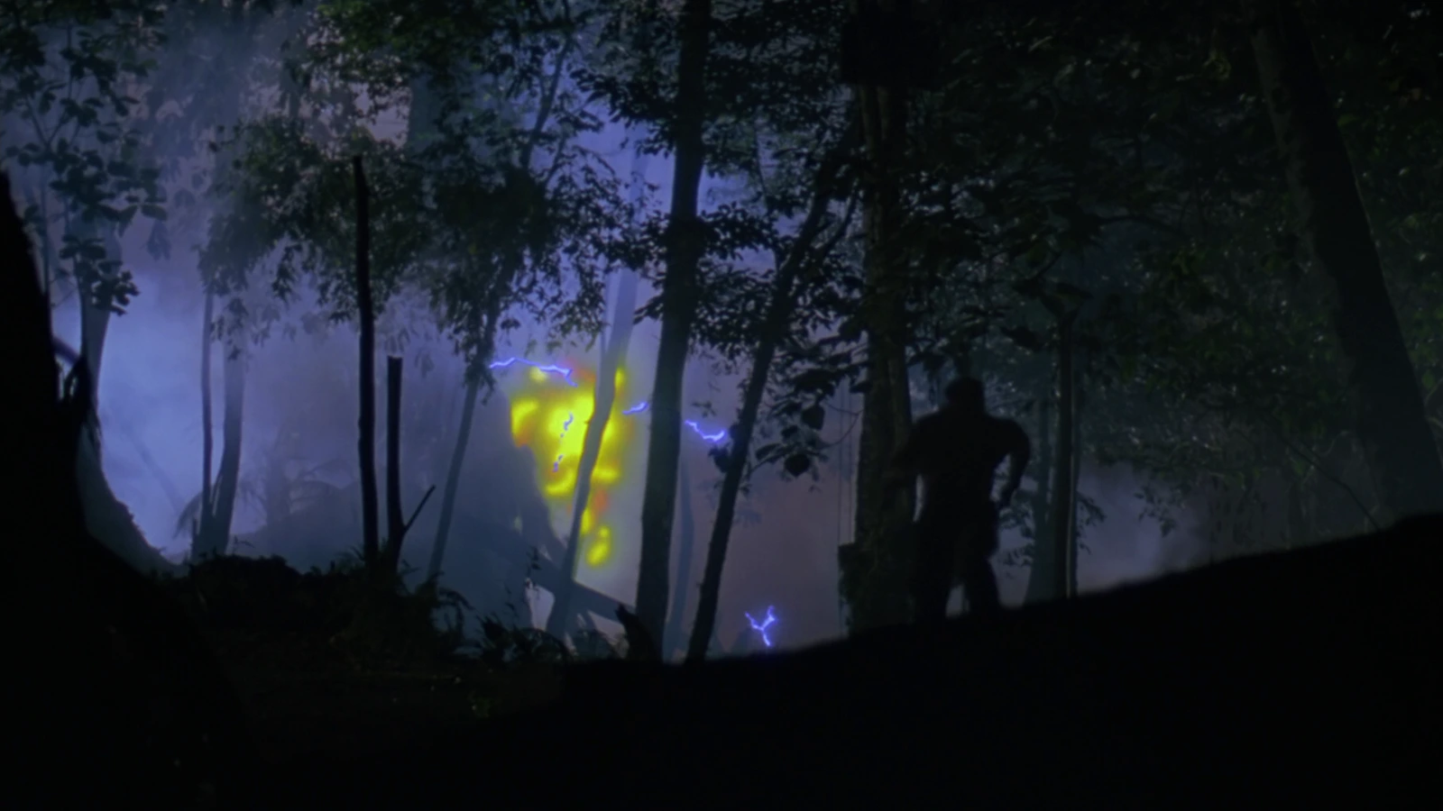 Dutch escaping the Jungle Hunter's self-destruct in Predator