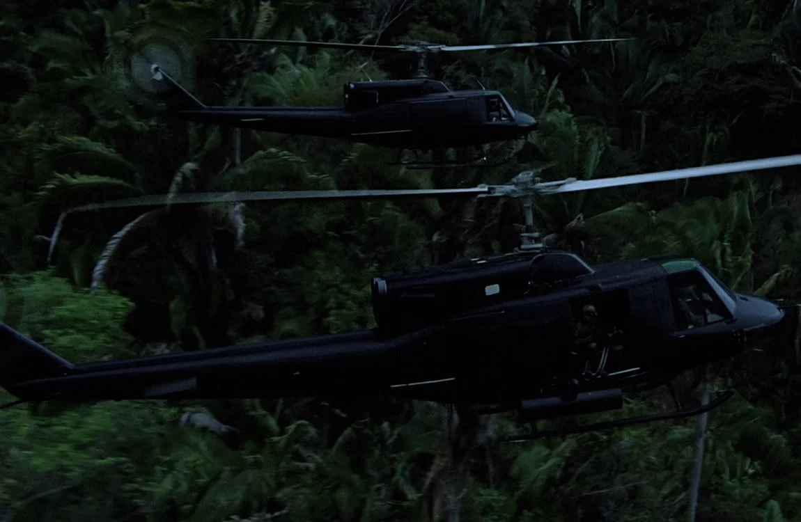 Vietnam War era choppers flying over the jungle in Predator
