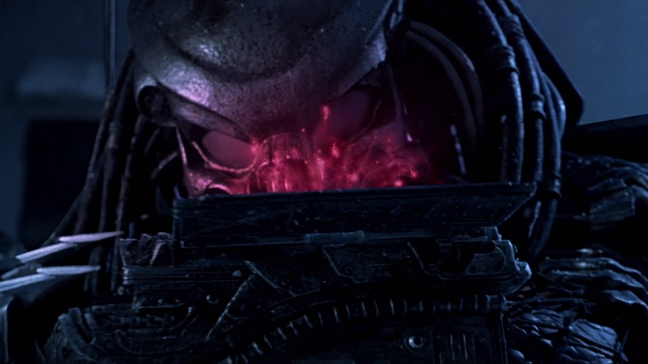 Celtic Predator looking at a holographic map of the Antarctic temple in Alien vs. Predator