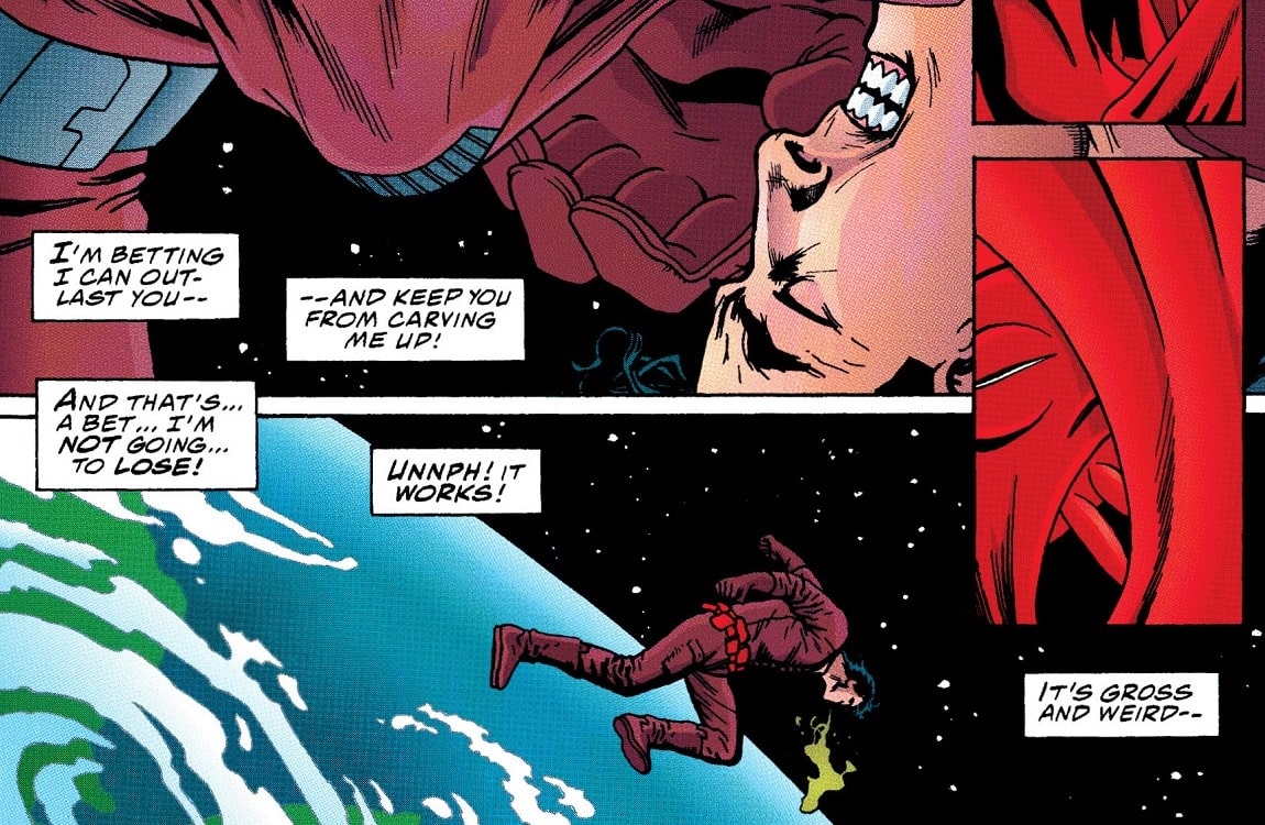 Superman fighting a Xenomorph inside himself in Superman vs. Aliens