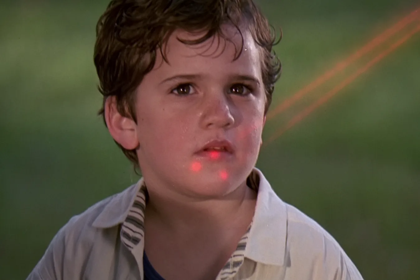 The City Hunter Predator targets a kid in a cemetery in Predator 2