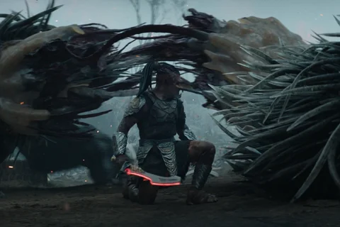 Dek beheading the Kalisk from Predator: Badlands