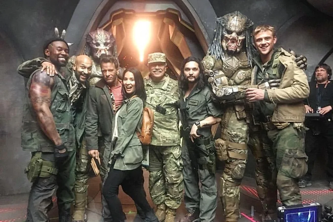 Edward James Olmos as Woodhurst with Traeger, Casey, the Loonies, and both hunters on The Predator set