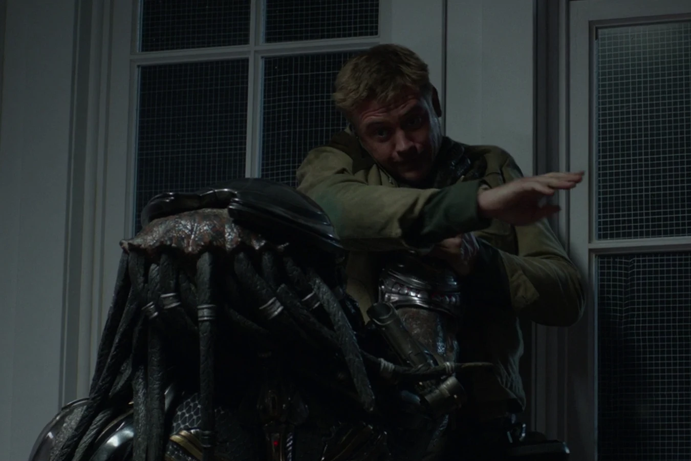Quinn McKenna facing the Fugitive Predator during the fight at the school