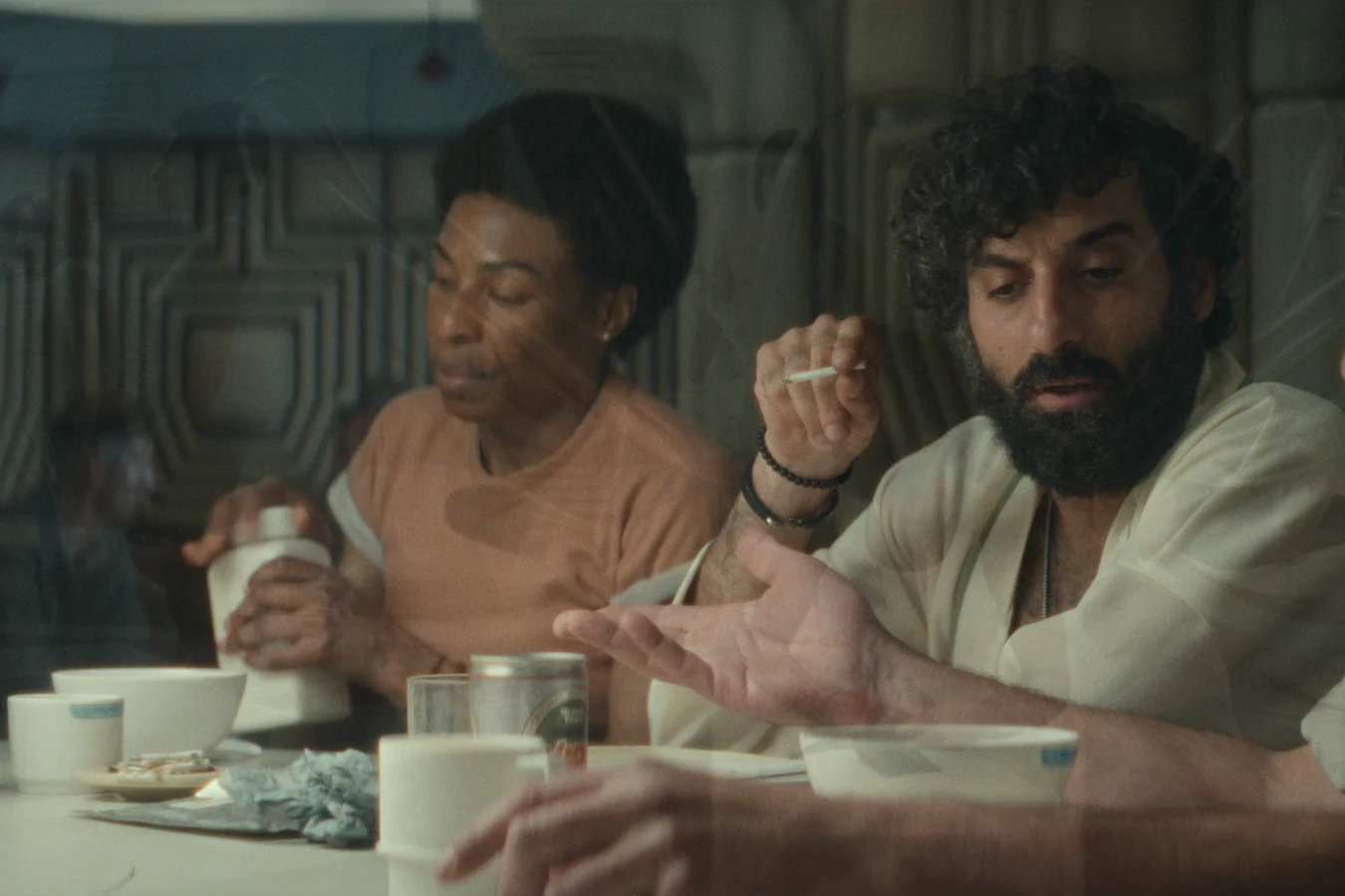 Rahim at the Maginot mess table with Chibuzo and Petrovich in Alien: Earth