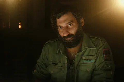 Rahim in his green Maginot uniform aboard the USCSS Maginot in Alien: Earth