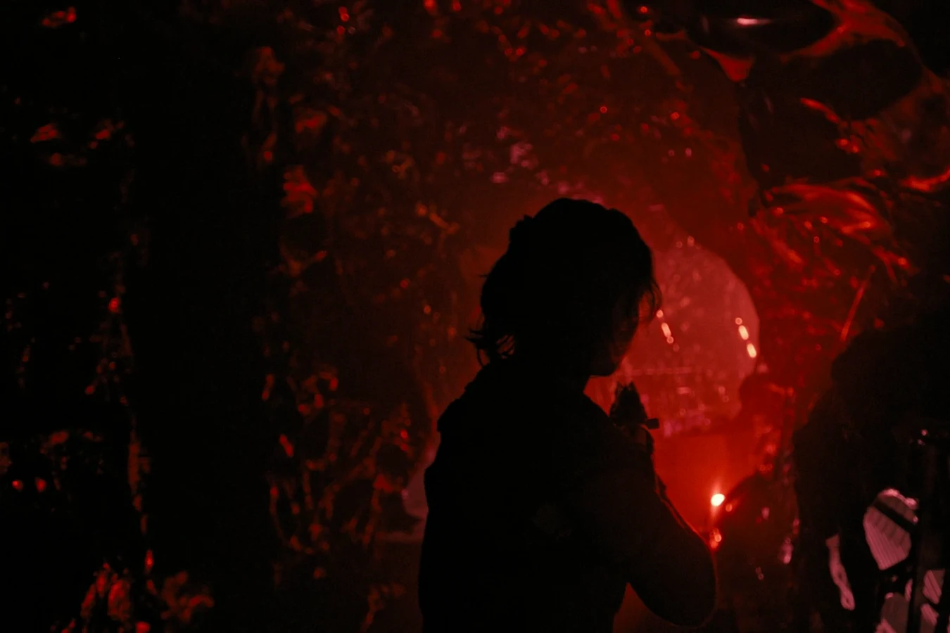 Rain Carradine moves through a Xenomorph hive aboard Renaissance