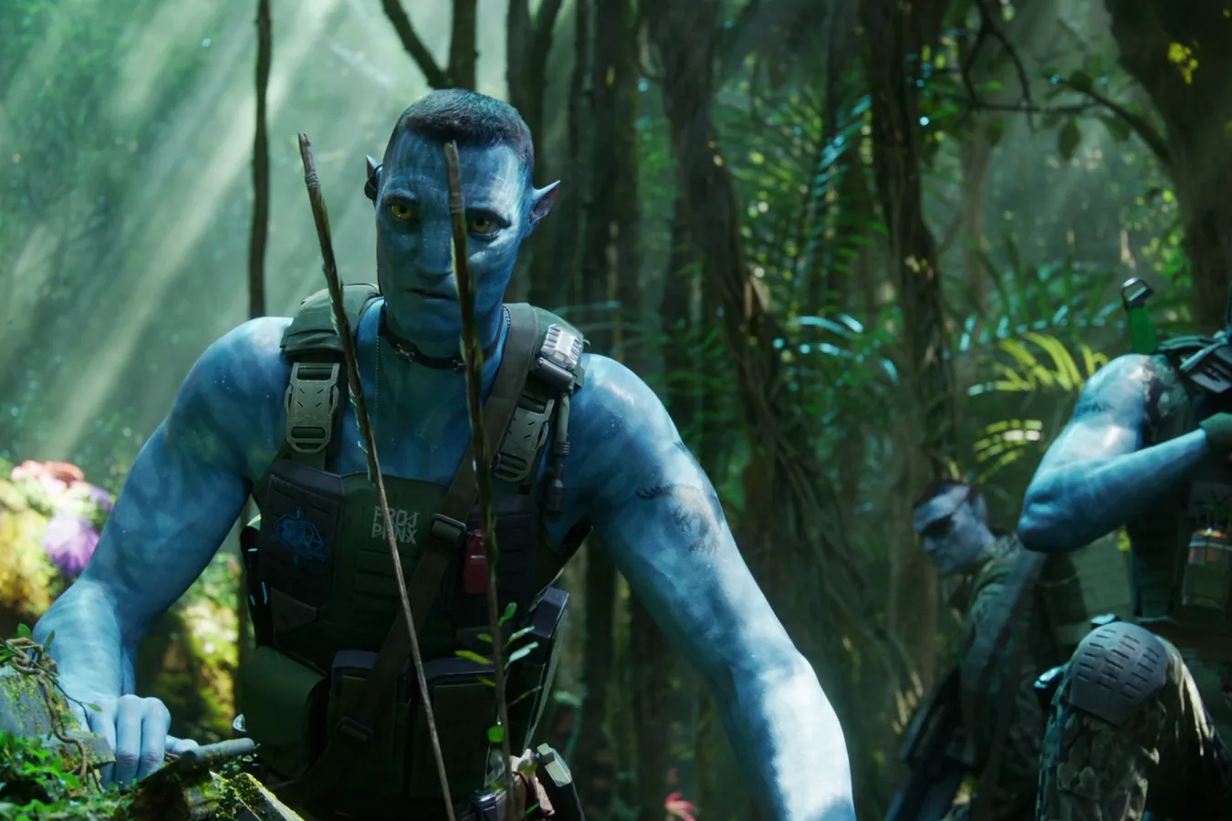 Recom Quaritch moving through the forests of Pandora with a rifle