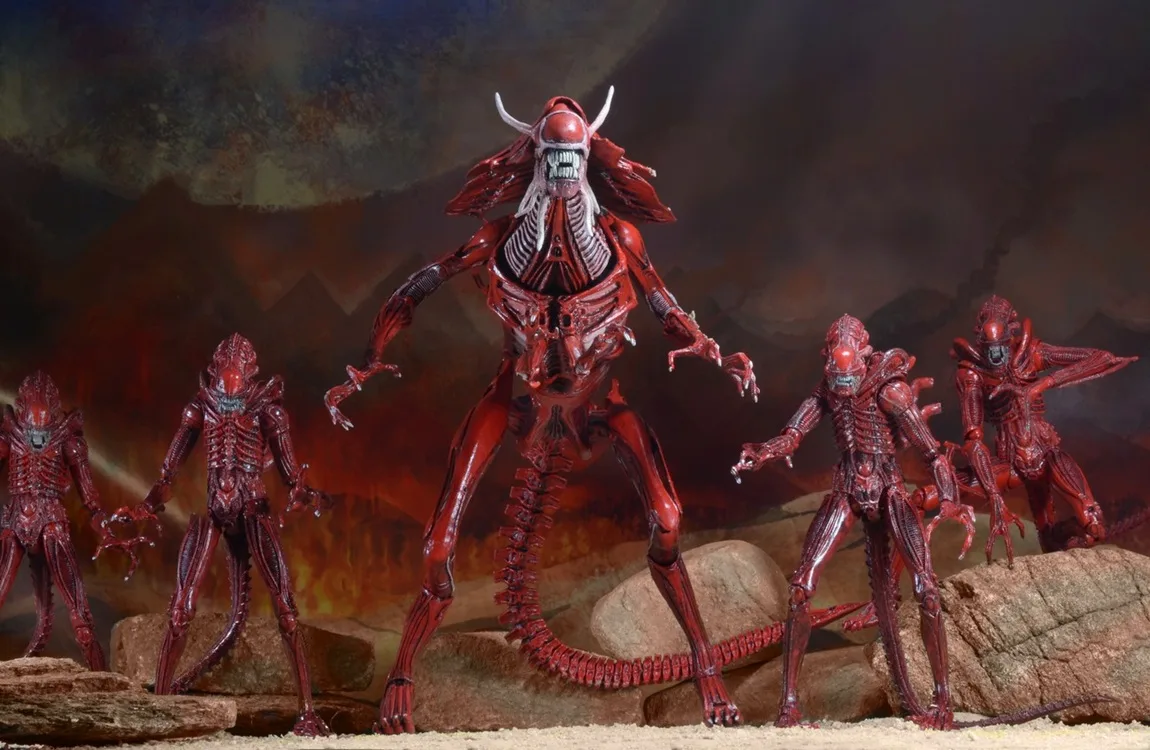 The Red Queen Xenomorph towering over her hive