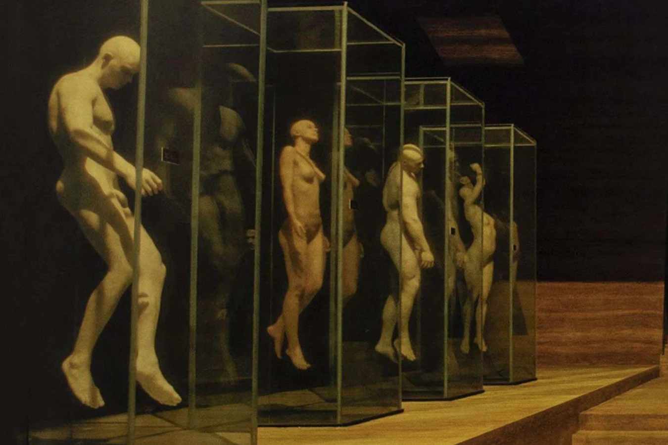 Earlier replicant models displayed in glass cases at the Wallace Corporation headquarters in Blade Runner 2049