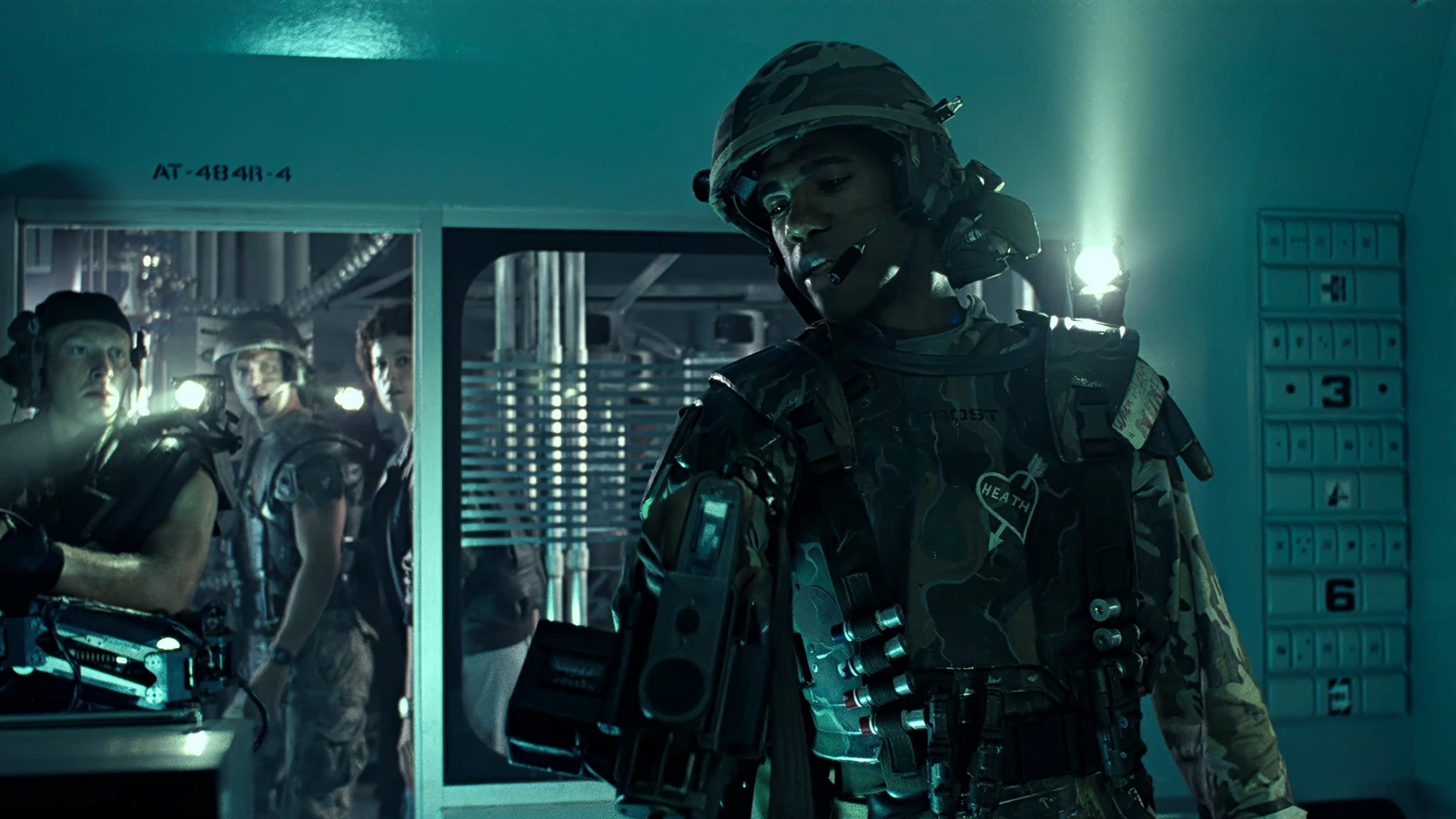 PFC Ricco Frost in M3 armor and M10 helmet with a TNR lamp during the Hadley's Hope sweep in Aliens
