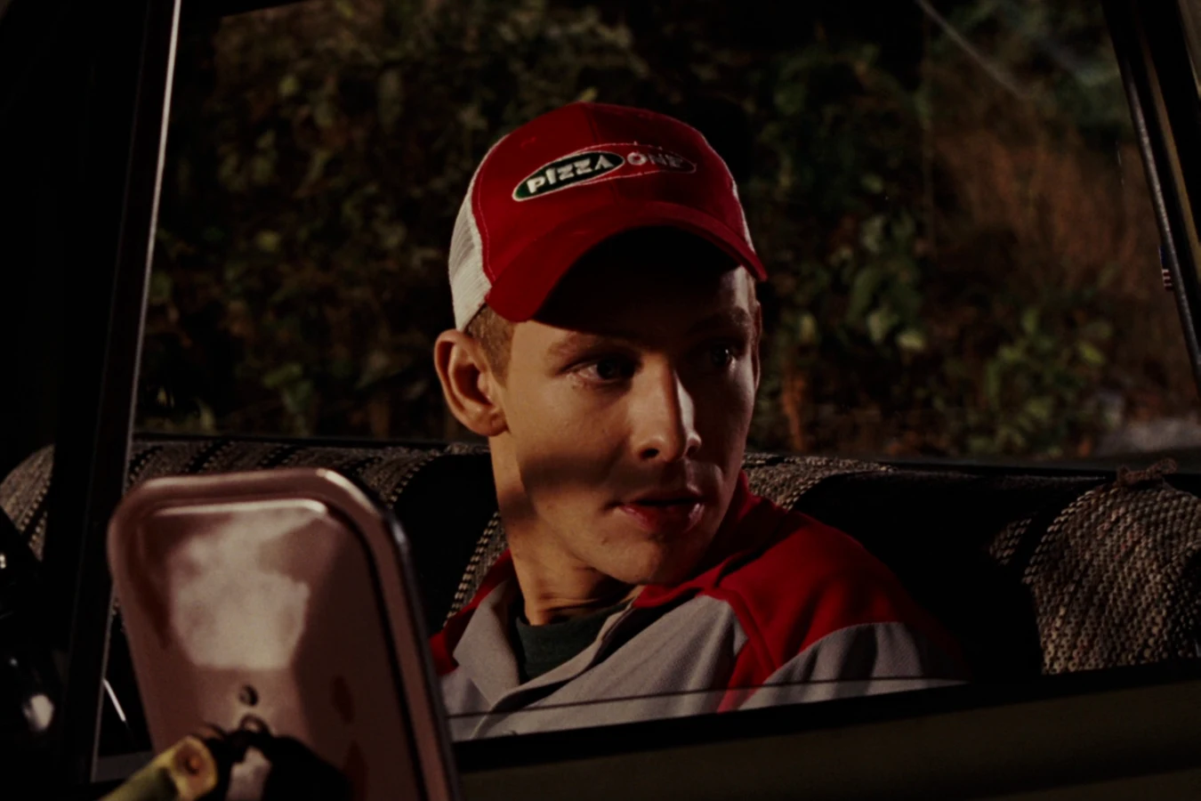 Ricky Howard at his Pizza One delivery car in Aliens vs. Predator: Requiem