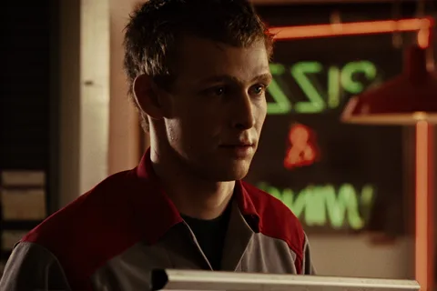 Ricky Howard in his Pizza One delivery jacket during the Gunnison outbreak in Aliens vs. Predator: Requiem