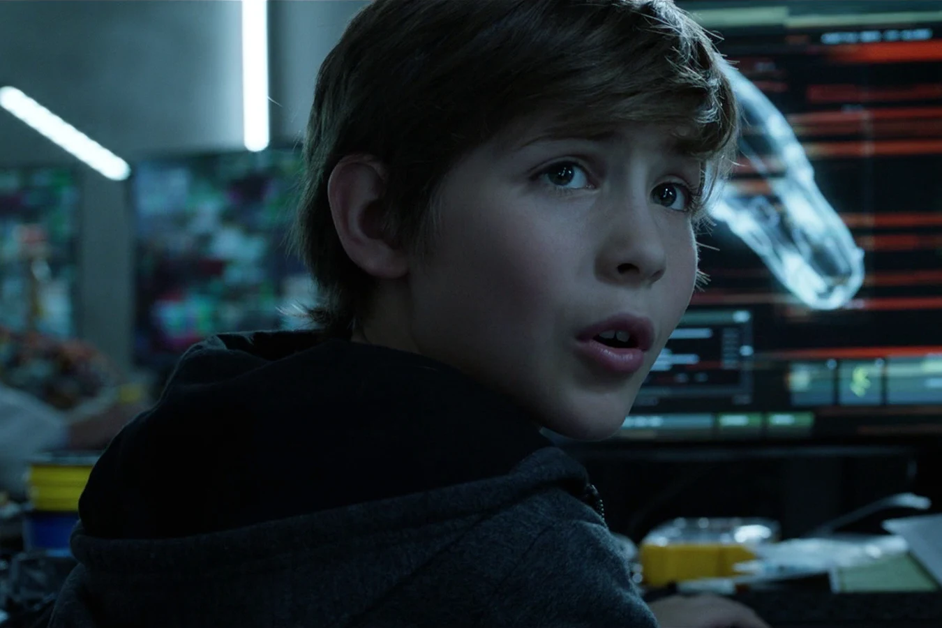 Rory McKenna facing glowing Predator interface screens after the Upgrade hunt