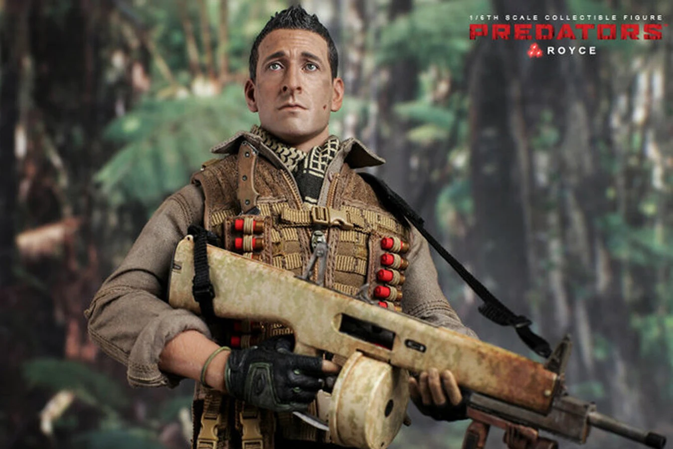 Hot Toys sixth scale figure of Royce holding his AA-12 shotgun in front of a jungle backdrop
