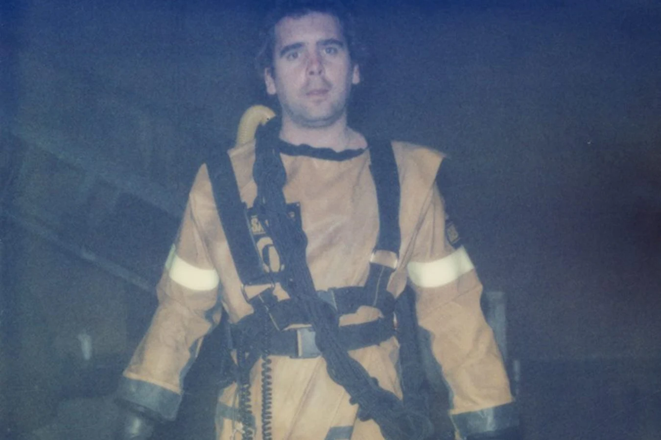 An Aliens extra in the yellow salvage isolation suit and harness