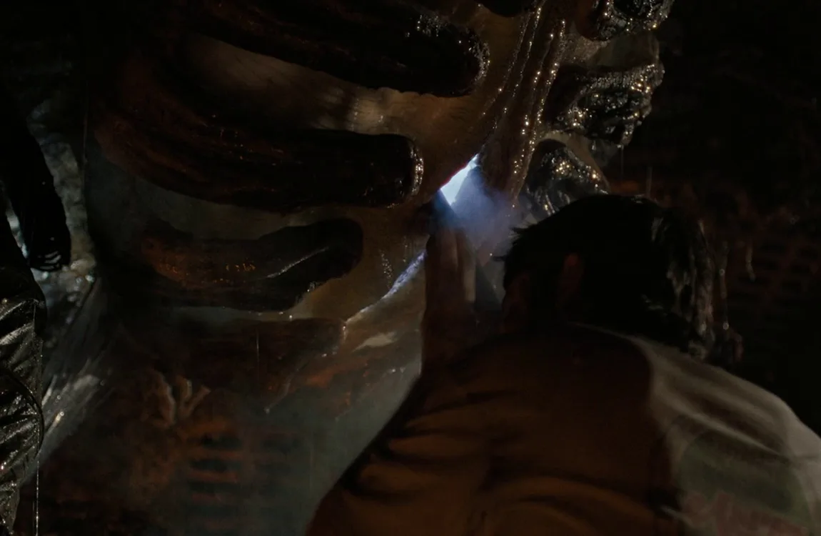 A close up of the Scorched Xenomorph's scarred head