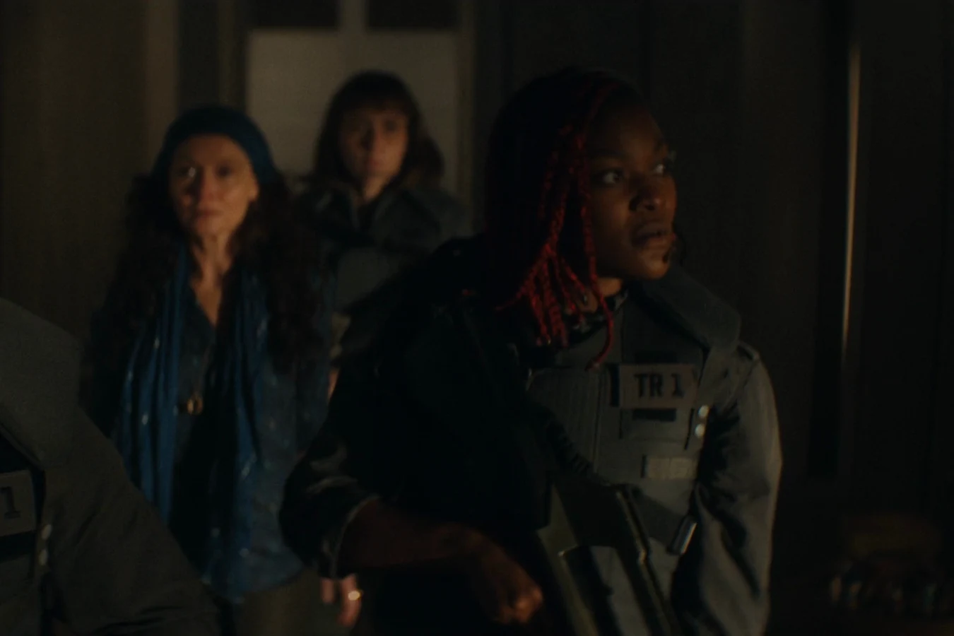 Siberian and Rashidi escorting Dame Sylvia through Neverland during the lockdown in Alien: Earth