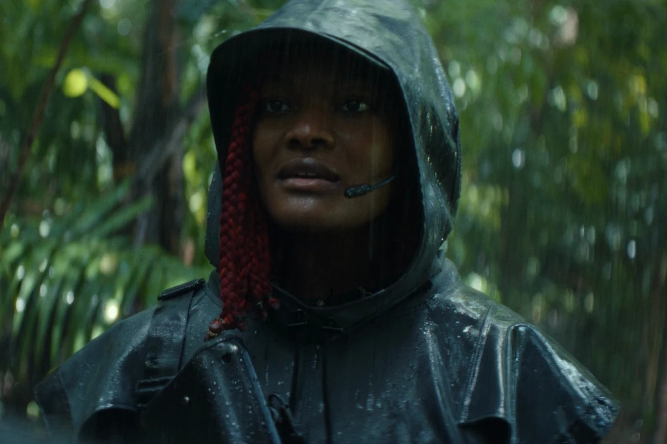 Siberian in a hooded rain poncho on patrol in the Neverland jungle in Alien: Earth