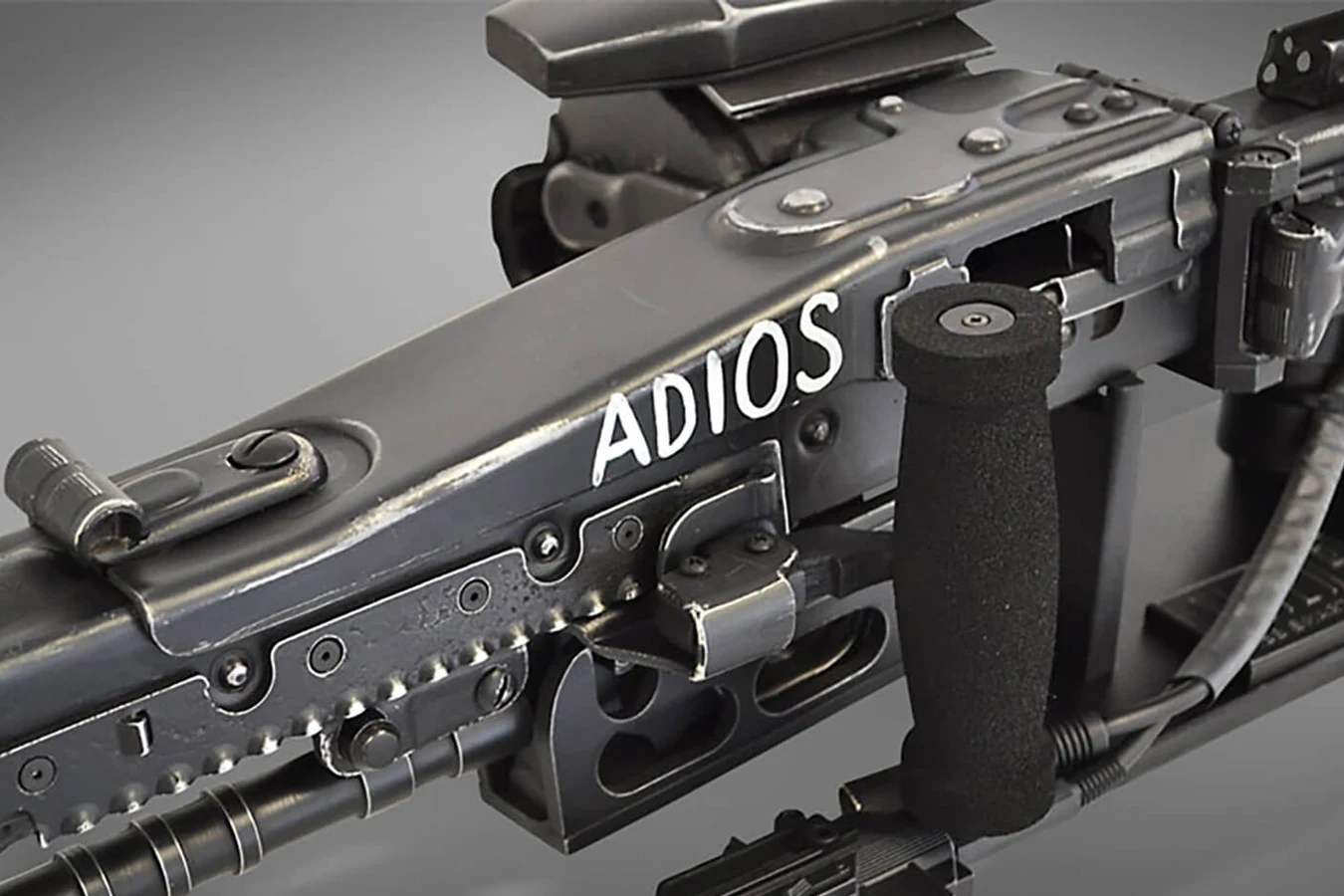 Close-up of the Aliens Smartgun prop with Vasquez ADIOS marking on the receiver